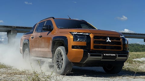 WITH its bold stance and rugged style, the Mitsubishi Triton kicks up dust as it dominates off-road terrain.