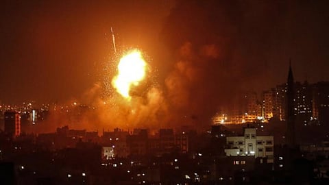 Air strike kills 8 in Gaza, Israel intercepts missile