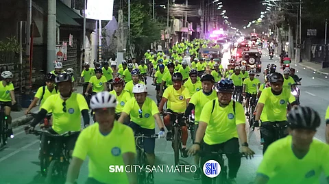 BIKERS pedal at SM City San Mateo to promote energy conservation.