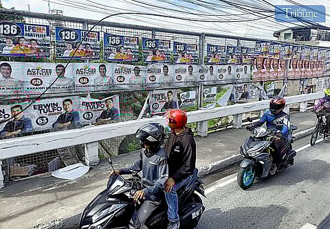 12 March 2025: Election campaign posters seen hung at Tullahan Bridge in Brgy. North Fairview in Quezon City, on Wednesday, 12 March 2025.