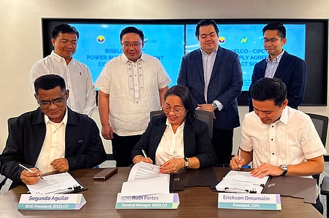 At the signing of the 15-year power supply deal are (from left) BISELCO board president Segundo Aguilar, BISELCO general manager Ruth Fortes and CIPC president Erickson Omamalin. Standing (from left) BISELCO bid and awards committee chairperson Selwin Alili, NEA project supervisor Ivan Zamora, Vivant Energy president Emil Andre Garcia and Vivant Energy vice president Mark Habana.