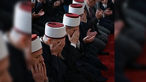 MUSLIM devotees offer prayers for Eid al-Fitr which marks the end of the holy fasting month of Ramadan, at the Grand Mosque of Pristina, Kosovo on 30 March 2025.