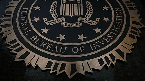 The seal of the Federal Bureau of Investigation (FBI) on the J. Edgar Hoover Federal Bureau of Investigation (FBI) building in Washington, DC, on 10 March 2025.
