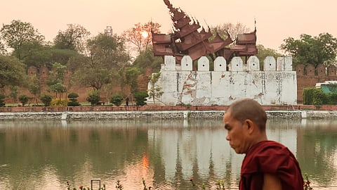 The ruling junta has asked the population to hold a minute's silence after a devastating earthquake.