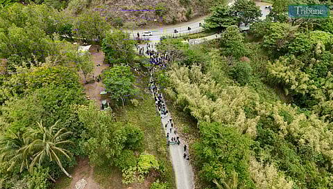 (April 01 2025) Hundreds of volunteers, conservationists, and community leaders belonging to various environment groups participate in a solidarity walk and symbolic bell tying against the 15-day eviction notice issued by the Department of Environment and Natural Resources (DENR) to the Blue Star, the organization responsible for the conservation efforts at the Masungi Georeserve, during a symbolic protest at the Masungi Nature Defense Camp in Baras, Rizal Province on Tuesday, April 1, 2025. The groups also urge the Department of Environment and Natural Resources (DENR) and other agencies involve to hold a dialogue and find a fair resolution that upholds both environmental conservation and responsible governance. Photo/Analy Labor