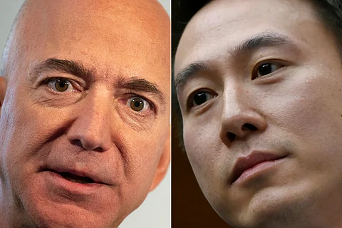 (COMBO) This combination of file pictures created on 2 April 2025 shows Amazon CEO Jeff Bezos (L) and TikTok CEO Shou Zi Chew. Amazon has made a last-minute bid to buy TikTok, which faces a US ban if not sold by its Chinese owner, the New York Times reported on 2 April 2025. The offer arrived in a letter to officials involved in talks regarding the sale of TikTok to appease US national security concerns, according to the New York Times.
OLIVIER DOULIERY, Eric BARADAT / AFP
