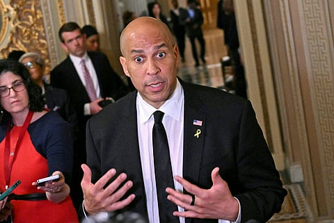 US Senator Cory Booker (D-NJ) speaks to the press at the US Capitol in Washington, DC on 1 April 2025. Democratic US lawmaker shattered a record for the longest speech in Senate history with a fiery protest against President Donald Trump's "unconstitutional" actions, beginning late 31 March 2025 — and still going Tuesday, more than 24 hours later. Senator Cory Booker's display of endurance — to hold the floor, he must remain standing and cannot even go to the bathroom — recalled the famous scene in Frank Capra's 1939 film classic "Mr. Smith Goes to Washington."