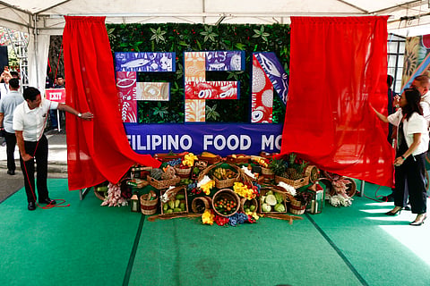 PRESIDENT Ferdinand Marcos Jr. unveils the new logo for the Filipino Food Month at a kickoff event in Lucena City Friday morning.