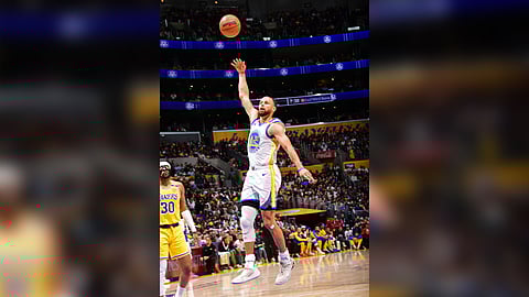 Stephen Curry dominates, firing 37 points to lift the Golden State Warriors to a 123-116 triumph over the Los Angeles Lakers in the NBA regular season.