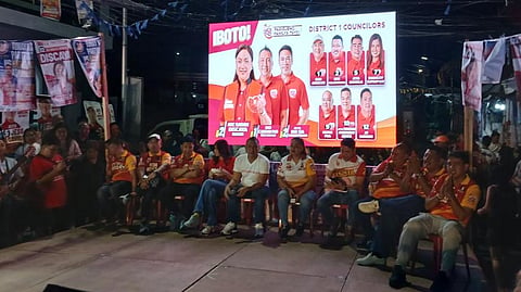Team Kaya This, led by Pasig mayoral bet Sarah Discaya (seated in the middle), during their caucus meeting in Barangay Buting on Wednesday evening.