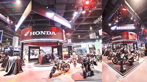 HONDA’s booth draws crowds with its bold new lineup.