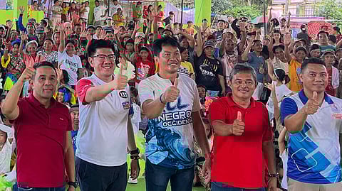 KAUNLAD Pinoy (#133) first nominee ‘Kuya Choi’ (second from left) returns to Candoni to celebrate with the community at Pabonggahan sa Barangay Haba 2025, where he proudly awarded the winning barangay in the lively dance competition. Kuya Choi reaffirms Kaunlad Pinoy’s dedication to the communities they’ve nurtured, promising to continue showing up, listening, and building together.