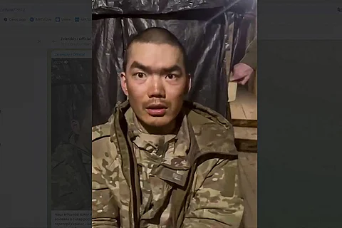 This handout video grab published on the official Telegram channel of Ukrainian President Volodymyr Zelensky on 8 April, 2025 shows, according to the Ukrainian president, one of two Chinese soldiers he said were captured by Ukrainian forces in the Donetsk region. Ukrainian President Volodymyr Zelensky said on 8 April 2025 that Ukrainian troops had captured two Chinese citizens fighting alongside Russian forces, adding that Kyiv would demand an explanation from Beijing and a reaction from its allies.