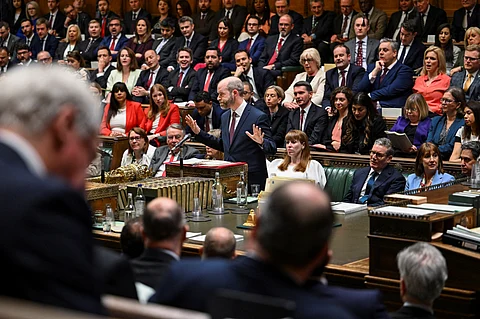 A handout photograph released by the UK Parliament shows Britain's Business, Energy and Industrial Strategy Secretary Jonathan Reynolds speaking during a special Saturday session as the government seeks to pass emergency legislation to save the British Steel company from closing down, in the House of Commons, in London, on 12 April 2025. UK lawmakers opened a rare Saturday session as the government seeks to pass emergency legislation to stop the last British factory that could make steel from scratch from shutting down. Prime Minister Keir Starmer has said his administration plans to "take control" of the struggling Chinese-owned British Steel plant to prevent its blast furnaces going out.