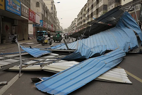 The remains of a metal structure are seen after it was blown over by high winds in Fuyang, in China’s eastern Anhui province on 12 April 2025.