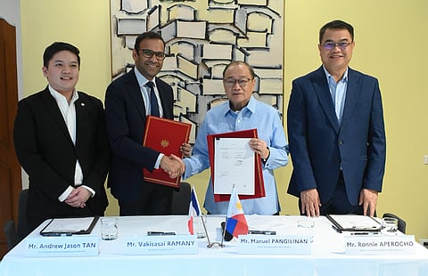 Meralco signed a memorandum of cooperation with Electricité de France SA to support the Philippines' move toward nuclear energy. Signatories include (from left) Meralco vice president and head of business development Andrew Jason Tan, EDF senior vice president Vakisasai Ramany, Meralco chairperson and CEO Manuel V. Pangilinan and Meralco EVP and COO Ronnie Aperocho.