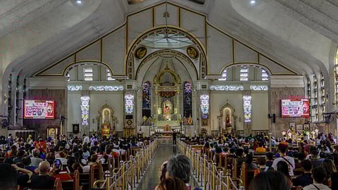Devotees continue to pray inside Quiapo Church.