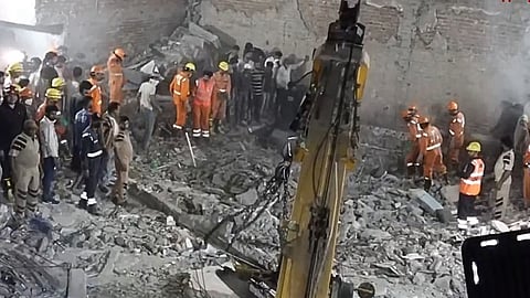 At least 11 killed in India building collapse