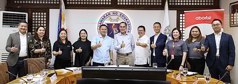 ABOITIZ Foundation Inc., Department of Education (DepEd) officials and other partners’ representatives give the thumbs up after the signing of the memorandum of agreement on the AuroraPH project covering 300 off-grid public schools across the country. They are (from left) David Jude L. Sta. Ana, chief external affairs officer at Aboitiz Equity Ventures; Graciela E. Mendoza, DepEd director IV; Maria Remedios Dominique Suplido, Aboitiz Foundation chief operating officer; DepEd Assistant Secretary Cilette Liboro Co; DepEd Secretary Edgardo ‘Sonny’ Angara; Aboitiz Foundation chairman Sabin Aboitiz; DFNN chairman Ramon Garcia Jr.; William Hu, managing director of Huawei Technologies; Aboitiz Foundation president Ginggay Hontiveros-Malvar; Jowelle Cruz, impact lead for education of Aboitiz Foundation; and Will Yu, vice president of Huawei Digital Power Philippines.