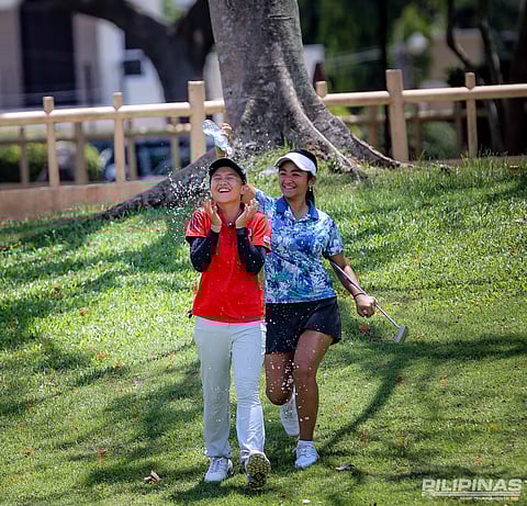 RAFA Anciano gets a victory shower after ruling the ICTSI Sherwood Hills Junior PGT Championship on Thursday at Sherwood Hills Golf Club.