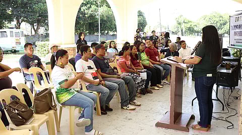 Participants and organizers of the MMSU mango processing training pose for a group photo in front of a banner at the university’s Food Innovation Center in Batac City, Ilocos Norte, on 25 April 2025.