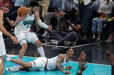 Ja Morant #12 of the Memphis Grizzlies reacts after falling during the first half of Game 3 against the Oklahoma City Thunder on April 24, 2025.