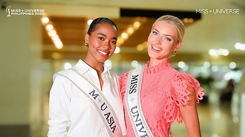 Miss Universe 2024 Philippines Chelsea Manalo and Miss Universe 2024 Victoria Kjær Theilvig smile for a photo together at the Miss Universe Philippines 2025 event, both wearing their official sashes.