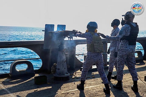 Philippine Navy personnel aboard BRP Ramon Alcaraz (PS16) operate a .50 caliber gun during a surface target shoot as part of the Gunnery Exercise of MME at San Felipe, Zambales on 25 April.