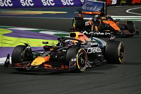 RED BULL Racing’s Dutch driver Max Verstappen and McLaren’s Australian driver Oscar Piastri race during the 2025 Saudi Arabia Formula One Grand Prix.