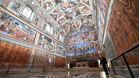 People visit the Sistine Chapel on the reopening day of the Vatican museum on February 1, 2021 in Vatican City, as the city-state eases its closure aimed at curbing the spread of the COVID-19 infection, caused by the new coronavirus. Pope Francis died on April 21, 2025 aged 88, a day after making a much hoped-for appearance at Saint Peter's Square on Easter Sunday, the Vatican said in a statement.