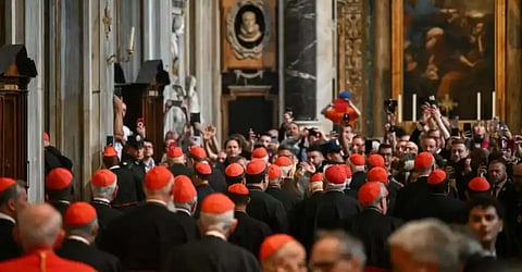 Cardinals with red zucchetto leave after a celebration of the Second Vespers at the Santa Maria Maggiore Basilica, which hosts the tomb of late Pope Francis, on the first day of its opening to the public after the Pope's funeral, in Rome on April 27.