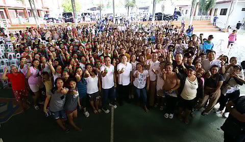 SENATOR Bong Go poses with local residents and officials during the opening of the Hermosa Super Health Center in Bataan, where he pledged continued efforts to expand grassroots healthcare services across the Philippines.