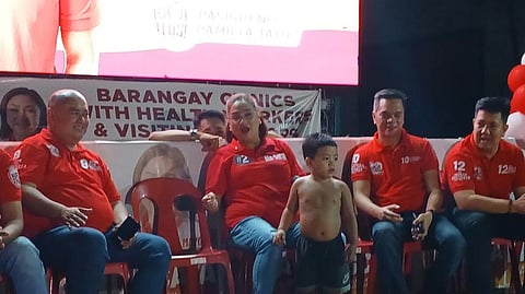 Boy’s embrace A heartwarming moment steals the show during a community caucus in Barangay Bagong Ilog Monday night, when a half-naked young boy climbs onto the stage just to embrace Pasig mayoral hopeful Ate Sarah Discaya — drawing smiles and applause from the crowd.
