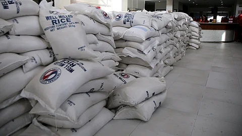The local government of San Juan City sells NFA rice at the city hall driveway on 24 February 2025. A 50-kilo sack is priced at P1,650 as part of the Department of Agriculture's Food Security Emergency.