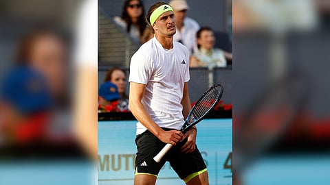 Alexander Zverev reacts after losing to Francisco Cerundolo in the Round of 16 of the men’s singles event of the Madrid Open.