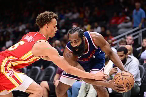 Dyson Daniels (left) of the Atlanta Hawks, the NBA leader in steals this season, emerges as Most Improved Player.