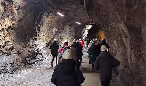 Visitors tour the Kiruna mine, the world’s largest and most modern underground iron ore mine.