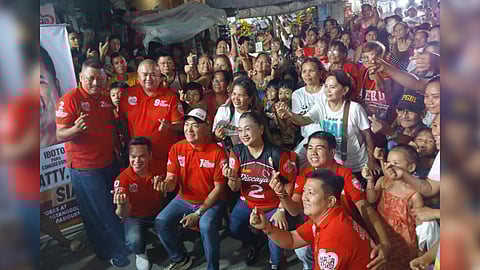Pasig City mayoralty candidate Sarah Discaya (seated, center) leads Team Kaya This as she woos residents of Barangay Kalawaan during a community forum last Saturday evening.