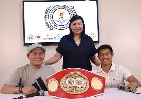 IBF champion Pedro Taduran (right) strikes a pose with his confident team made up of lead trainer Carl Peñalosa Jr. (left) and chief handler Cucuy Elordo.