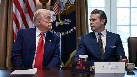 US President Donald Trump (L) and Pentagon chief Pete Hegseth are seeking to bar transgender troops from serving in the military