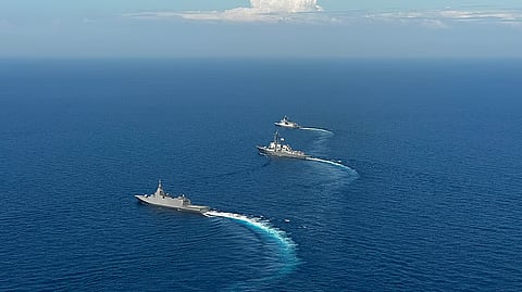 (FILE PHOTO) An aerial shot of BRP Jose Rizal (FF-150), USS Shoup (DDG-86), and JS Noshiro (FFM-3) sailed in formation during the 8th iteration of multilateral maritime cooperative activity (MMCA) among the Philippines, United States and Japan about 31 nautical miles east of Bajo de Masinloc (Scarborough Shoal) in the West Philippine Sea (WPS) on 28 March 2025.