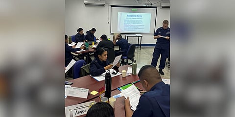 Philippine Coast Guard (PCG) trainees participate in a practical exercise on evaluating subordinates during the Leadership and Management School (LAMS) course led by the U.S. Coast Guard (USCG).