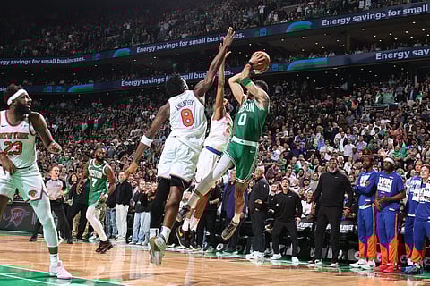 OG Anunoby and Mikal Bridges employ tight defense on Jayson Tatum to help the New York Knicks preserve a 91-90 win over the Boston Celtics in the NBA Eastern Conference playoffs series.