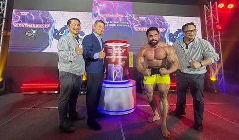 Nippon Paint launches Weatherbond Quartz Series for superior exterior protection. (From left) Nippon Paint senior sales manager for VisMin Danny Diluvio II, general manager Chen Lee Siong, a champion bodybuilder symbolizing strength and durability and senior sales manager for Luzon Calvin Tan give a thumbs up during the launch of Nippon Paint’s Weatherbond Quartz Series.