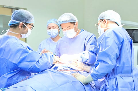 Dr. Jerold Justo and medical team perform 3D-printed cranial reconstruction.