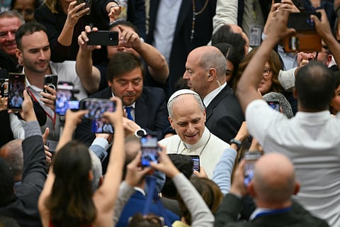 LOOK: Pope Leo XIV (C) meets with journalists during an audience to representatives of the media, at Paul-VI hall in The Vatican, on 12 May 2025.