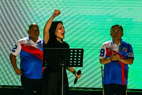 SPEAKING before a cheering crowd at Liwasang Bonifacio during PDP Laban’s miting de avance, Kitty channels the legacy of former President Rodrigo Duterte. With her on stage are Senators Ronald ‘Bato’ dela Rosa and Christopher ‘Bong’ Go — key allies in her father’s political journey.