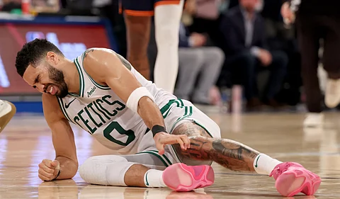 JAYSON Tatum of the Boston Celtics grimaces in pain after tearing his right Achilles during Game 4 of their NBA Eastern Conference Playoffs series against the New York Knicks.