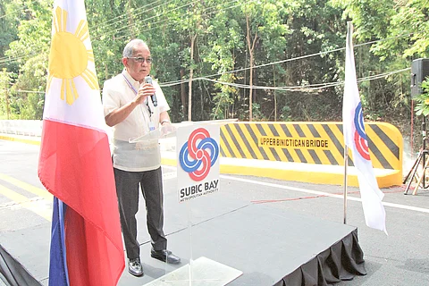 SUBIC Bay Metropolitan Authority Chairman and Administrator Engineer Eduardo Jose L. Aliño delivers his inspirational message to formally inaugurate the ₱44-million new Upper Binictican Bridge yesterday.