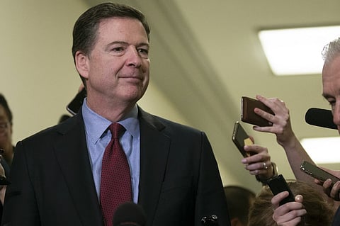 U.S. probes Trump 'threat' by ex-FBI chief Comey